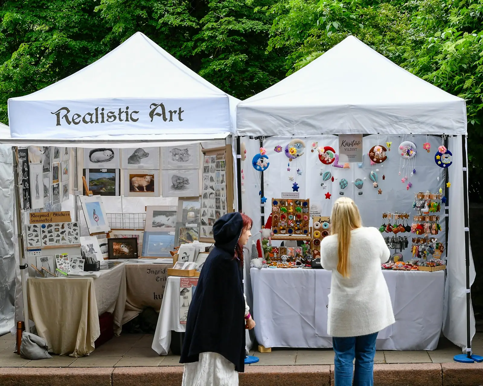 Outdoor art festival booths lining a street
