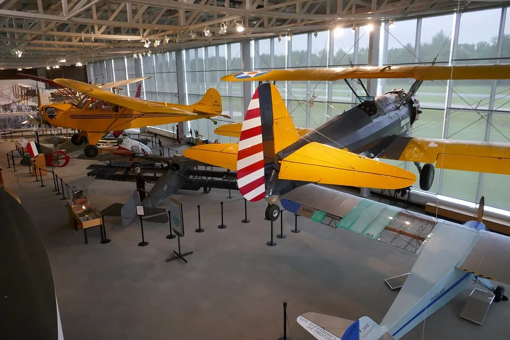 Vintage yellow biplanes inside the College Park Aviation Museum