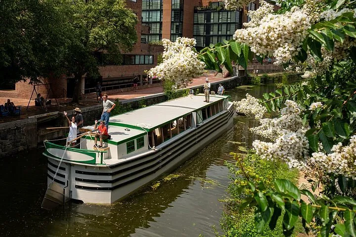 A canal boat full of passengers on the C&O Canal in Georgetown