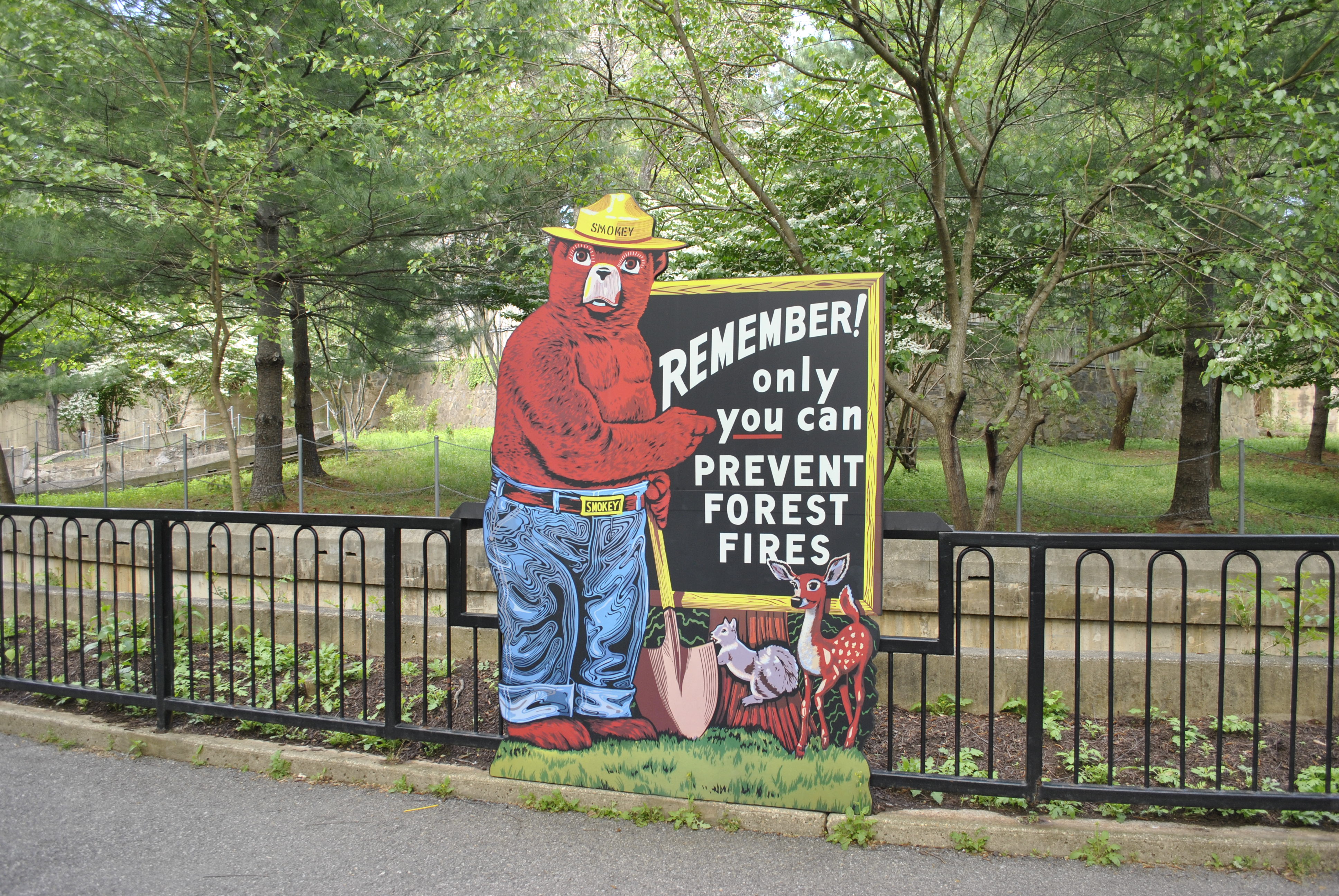 Smokey Bear sign along the path